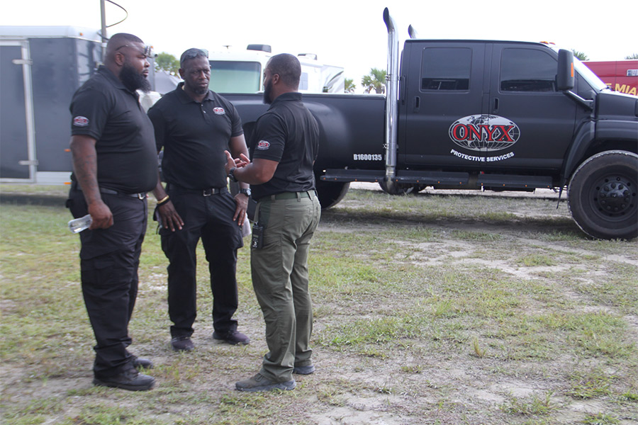 guards-in-parking-lot-talking-mirmar-fl